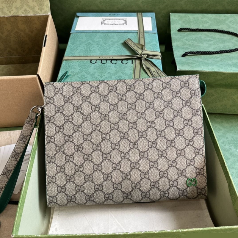 G*u*i clutch bags